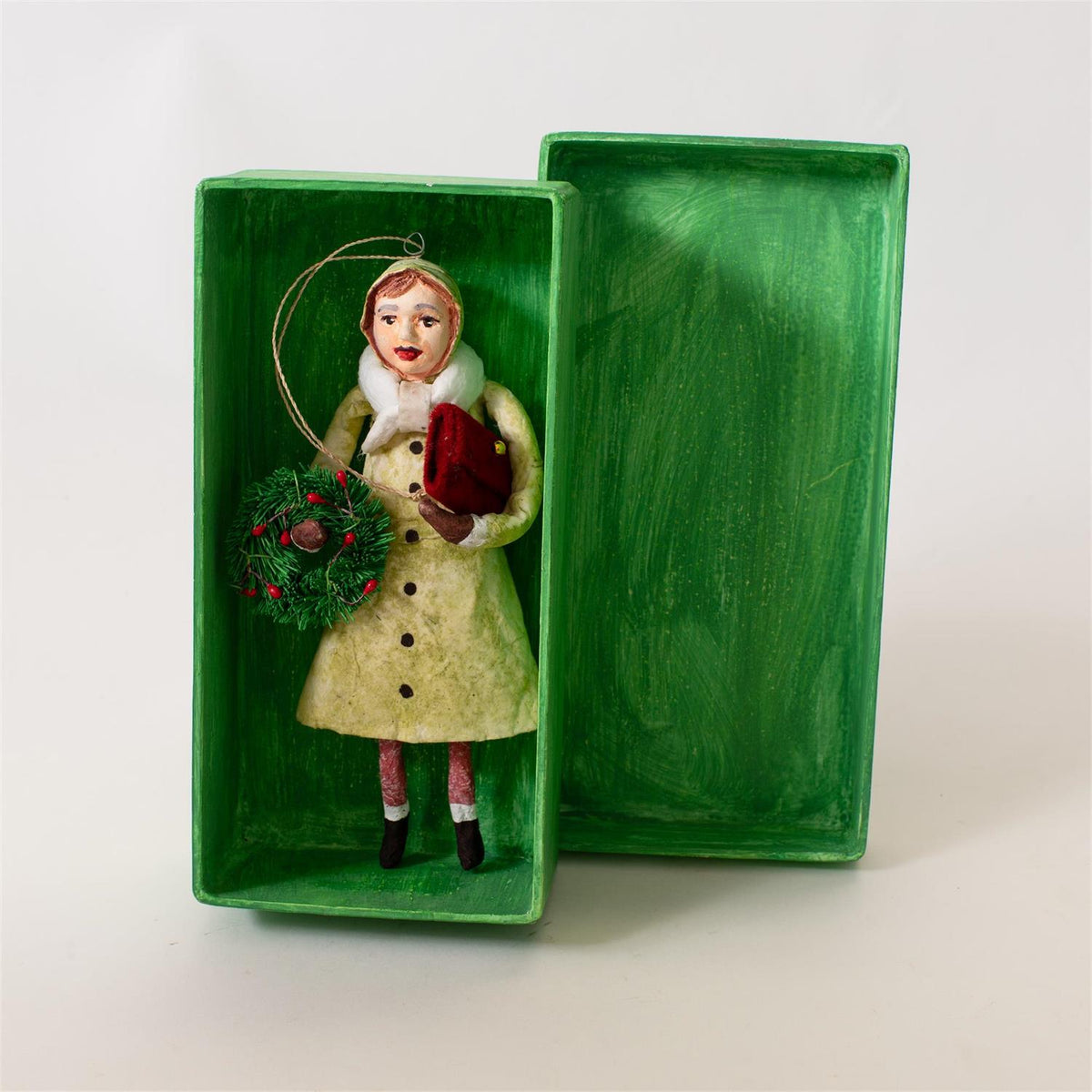 Taking Home the Wreath Figurine